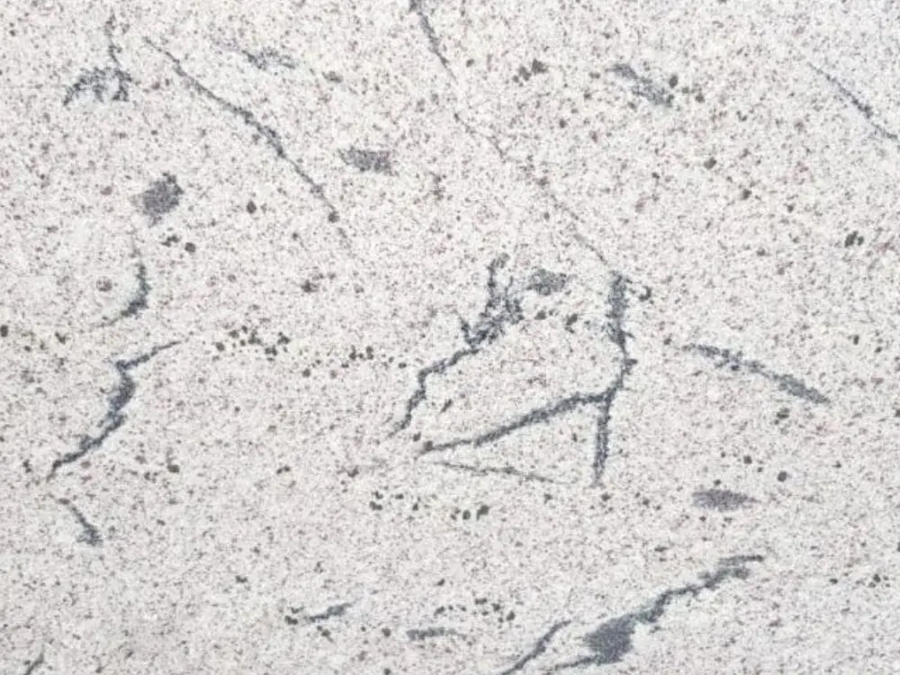 Far East White Granite Slab Specifications Primary Color(s): White Accent Color(s): Gray, Black Material Type: Granite Price Range: Medium Finish: Polished (Other finishes available upon request) Slab Thickness: 2 cm, 3 cm, 4 cm, 5 cm, 6 cm, 8 cm, 10 cm, 12 cm Country of Origin: India Far East White Granite